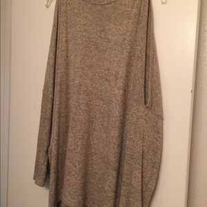 Lose fitting open shoulder top